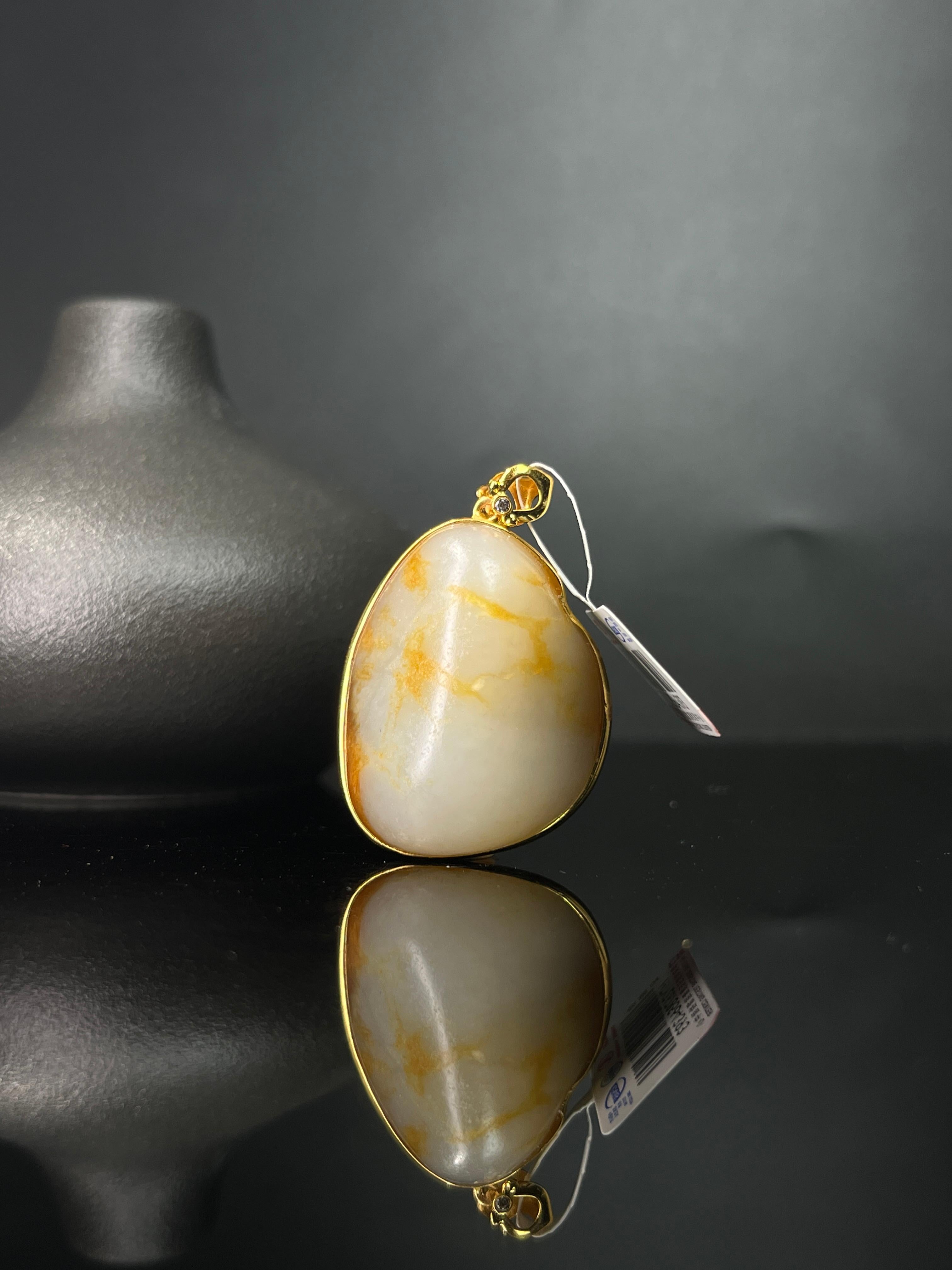 新疆和田玉籽料原石聚红皮18k金镶玉吊坠10（yc243628） – 添福玉器