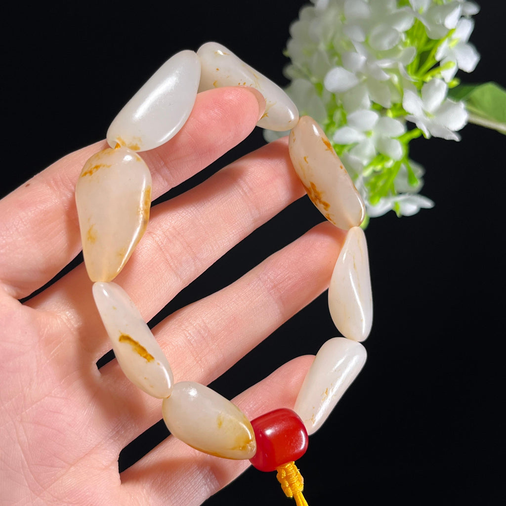 和田玉白玉洒金皮红皮籽料原籽手串（yc347505）
