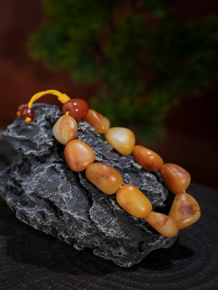 和田玉——红沁皮籽料原石手串