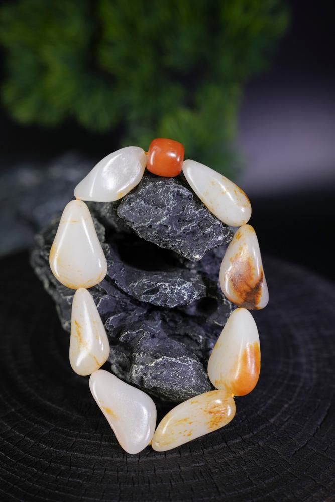 新疆和田玉白玉带红皮籽料原石手串（yc229714）