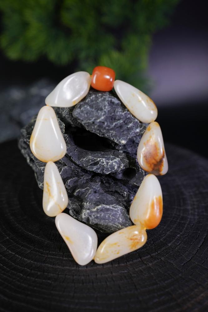 新疆和田玉白玉带红皮籽料原石手串（yc229714）