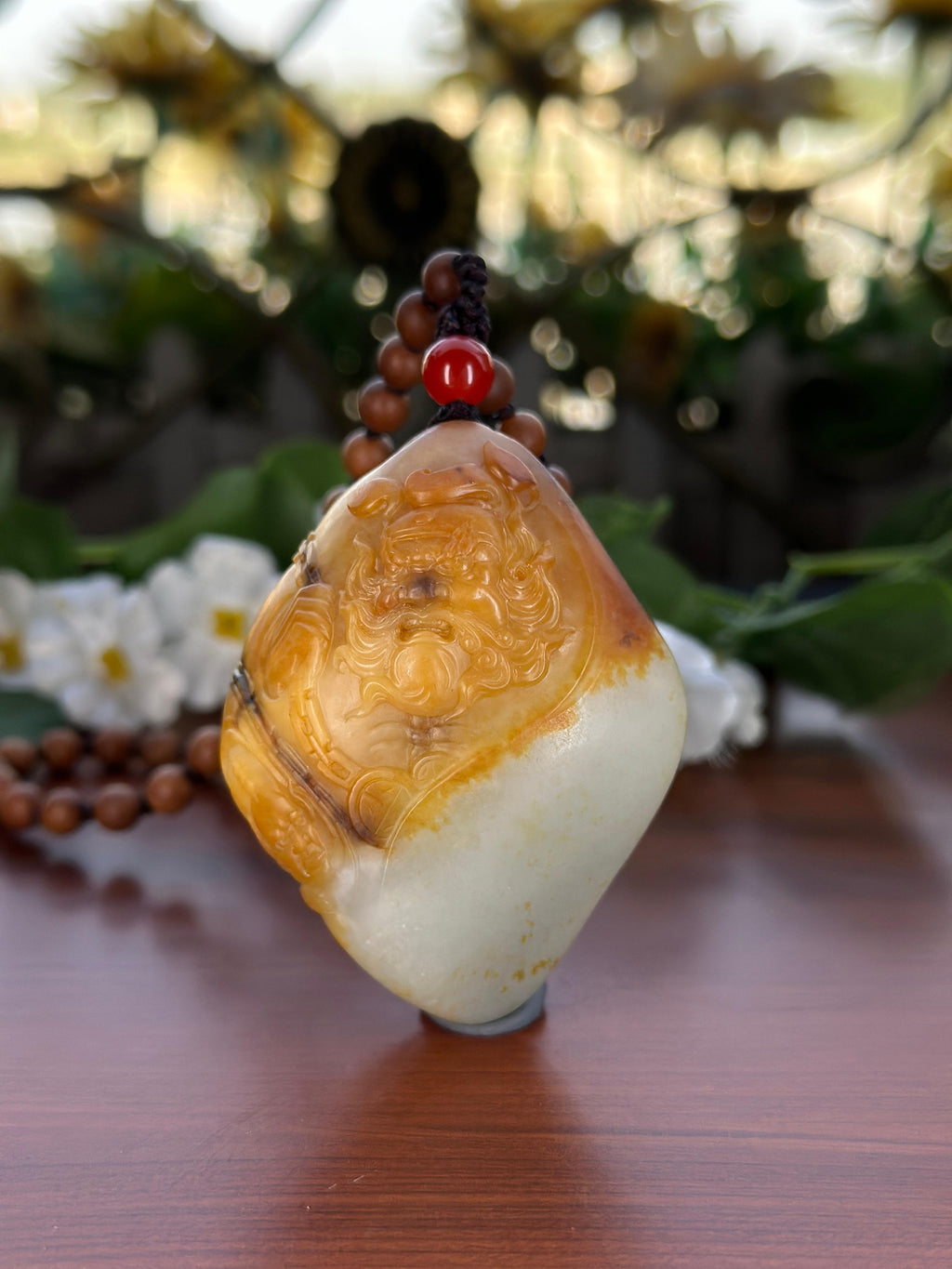新疆和田玉珍品白玉聚黄皮籽料钟馗手把件（yc710400）
