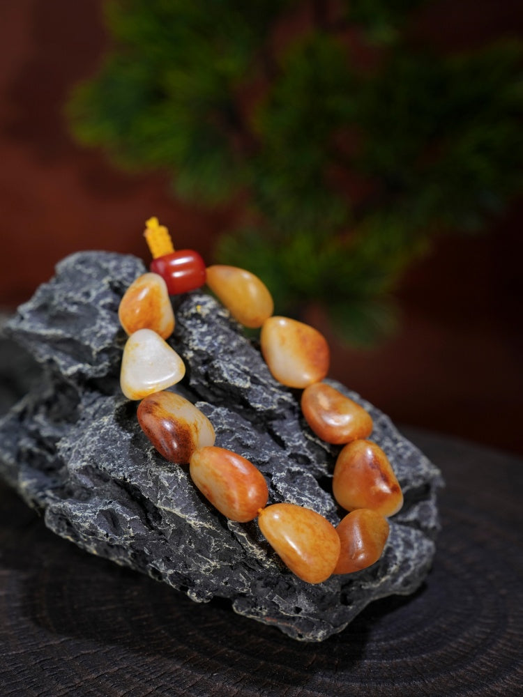 和田玉——红沁皮籽料原石手串