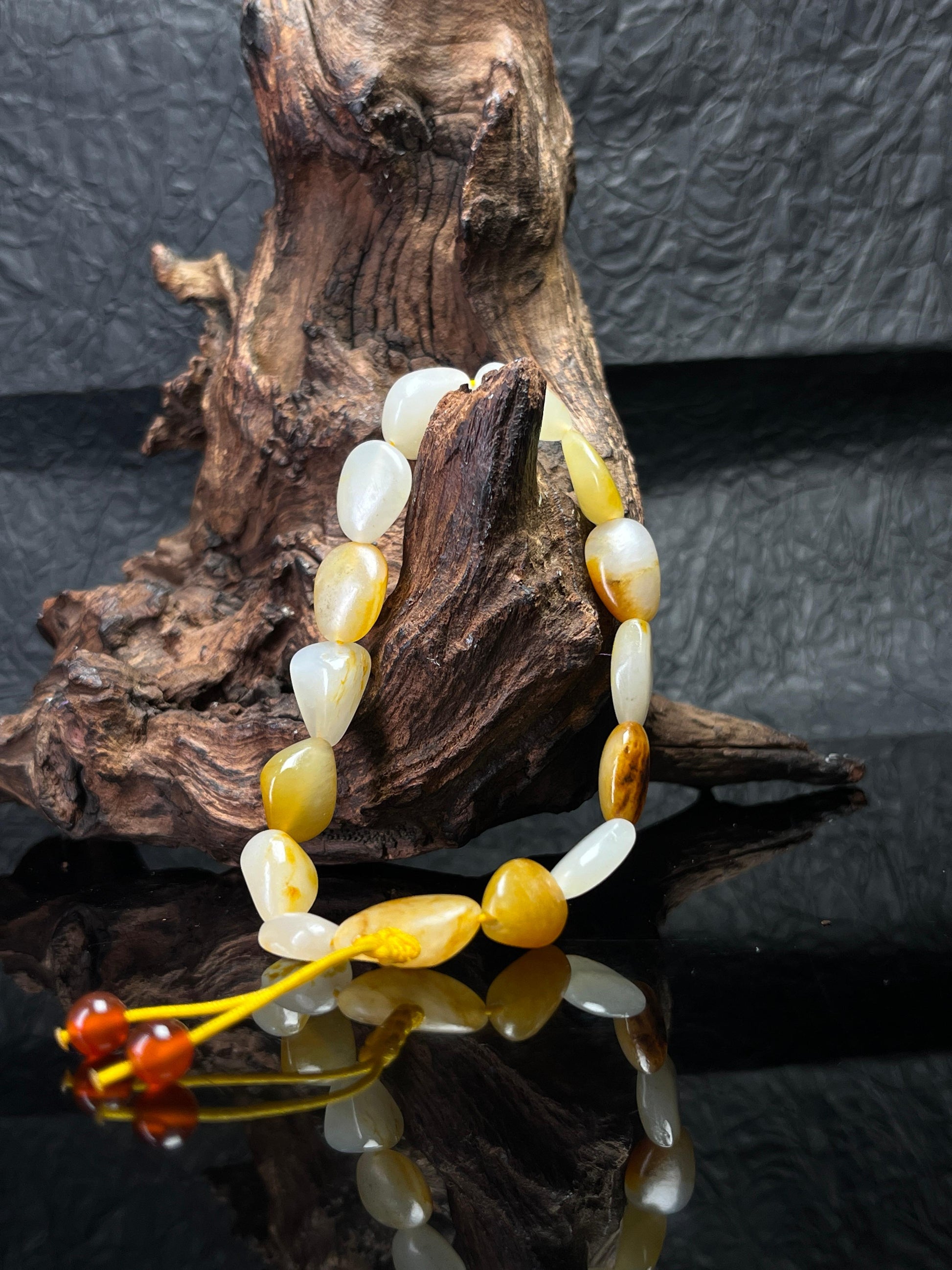 新疆和田玉天然籽料原石黄沁手串原皮原籽（yc232604）