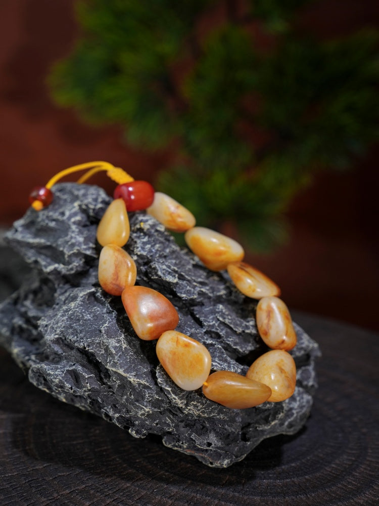 和田玉——红沁皮籽料原石手串