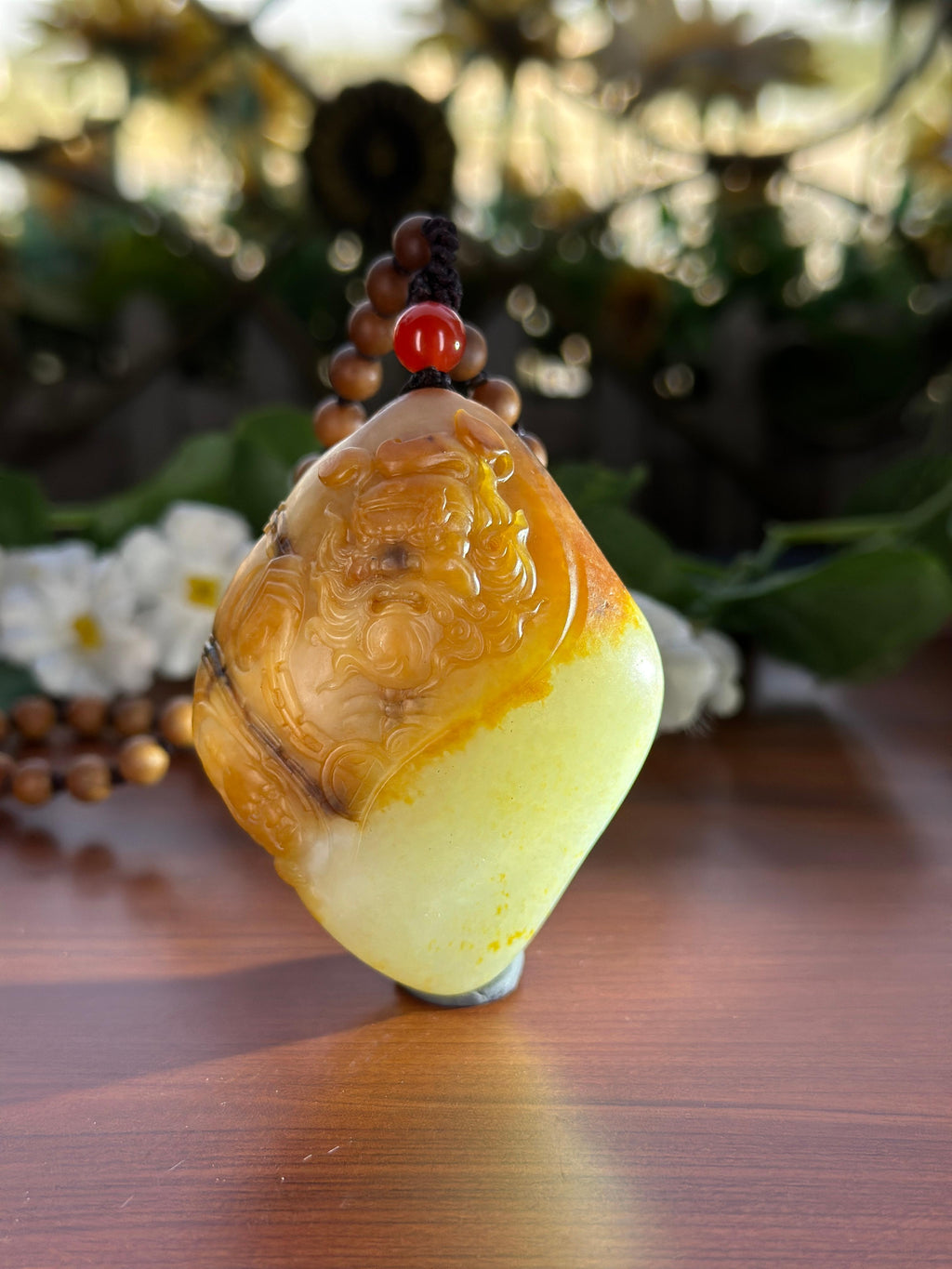 新疆和田玉珍品白玉聚黄皮籽料钟馗手把件（yc710400）