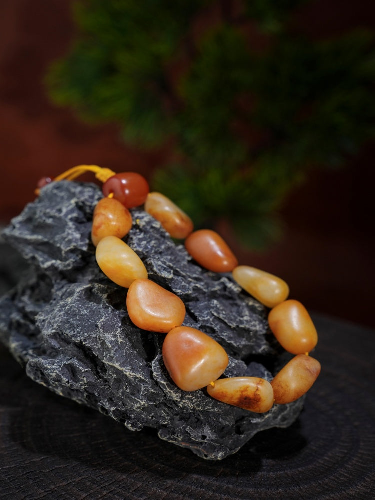 和田玉——红沁皮籽料原石手串