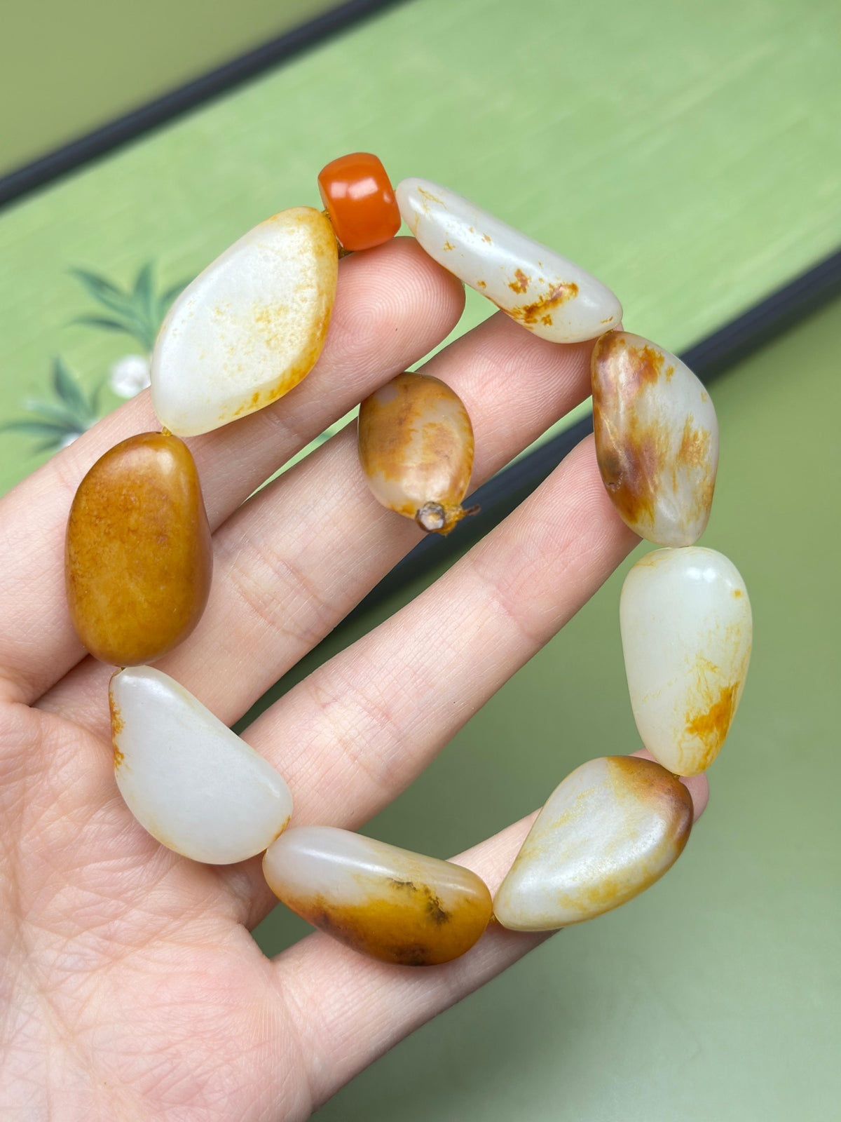 新疆和田玉臻品红沁洒金皮红皮原籽手串（9颗）（yc754414）