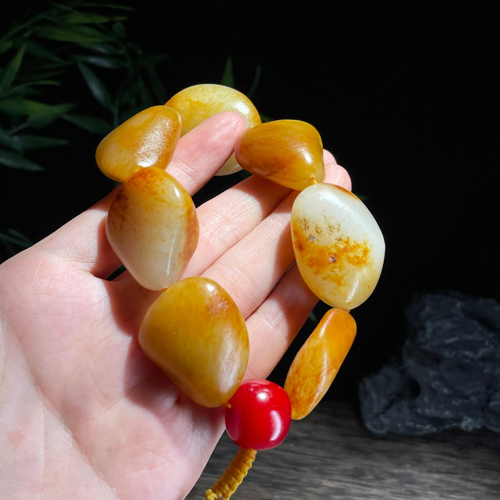 新疆和田玉珍品洒金皮红皮原籽手串（7颗）（yc723075）